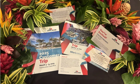 Printed event invitations with tropical flowers
