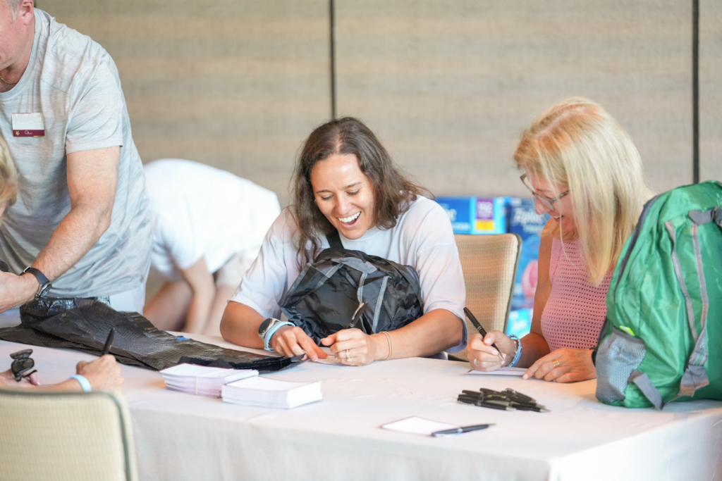 Attendees write notes for emergency readiness kits
