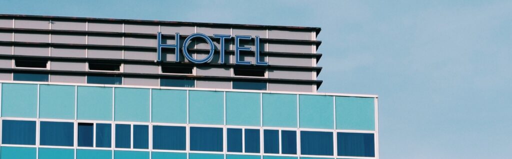 Sign at the top of a hotel reading "Hotel"