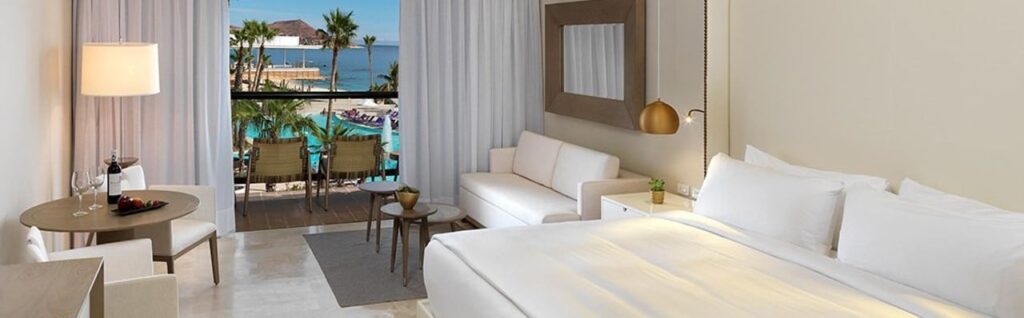 Interior of a hotel guest room with ocean views