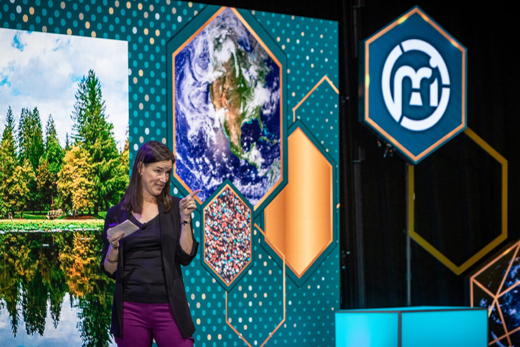 Pamela Wuest presents onstage at the 2023 M&IW Summit.