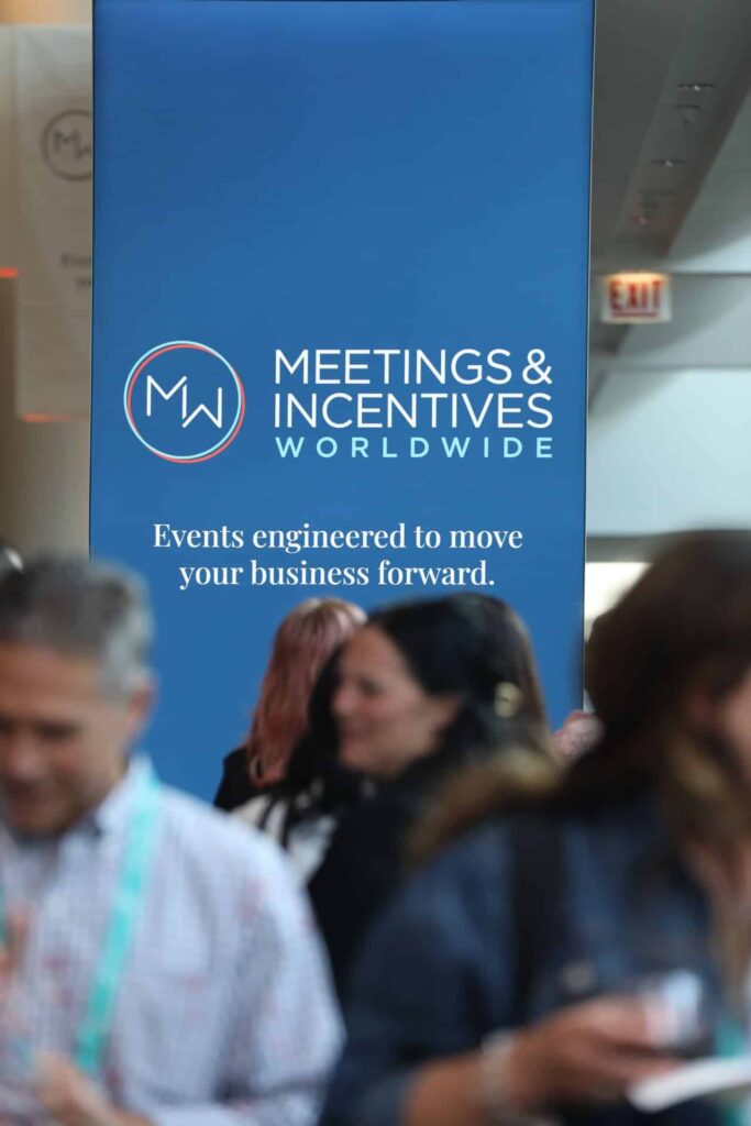 The new M&IW logo and tagline displayed at the 2026 M&IW Summit