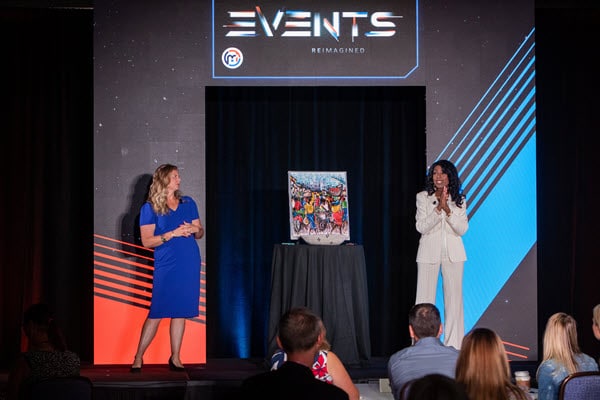 Hybrid Event Emcees on Stage