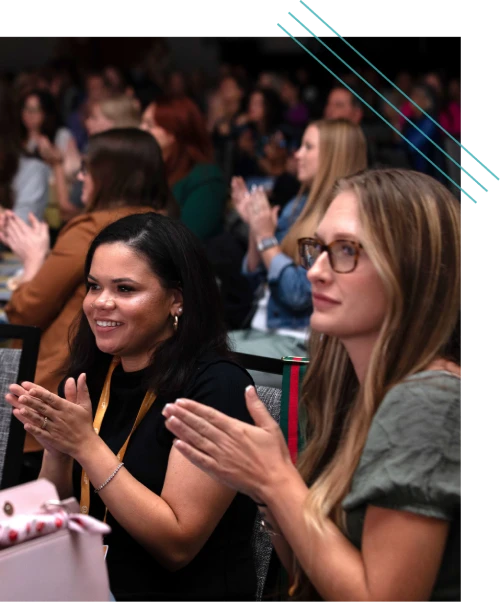 Attendees applauding during a corporate event