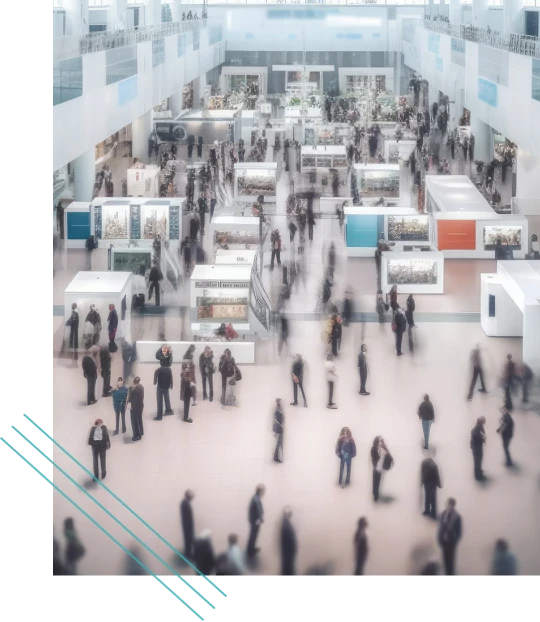 Busy trade show floor with exhibitor booths