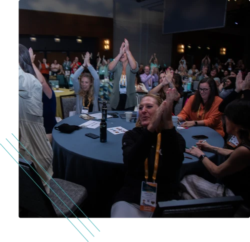 Audience cheering at an employee recognition event
