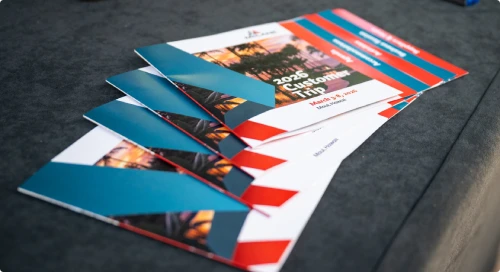 Printed event brochures and marketing materials