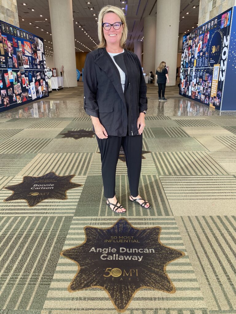 Angie Duncan Callaway in front of her star at MPI WEC
