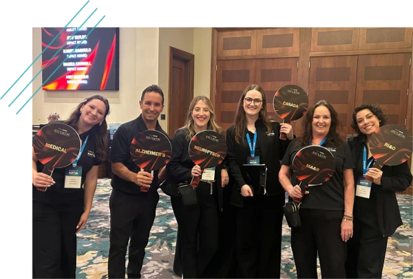 Event team members posing together at a medical conference