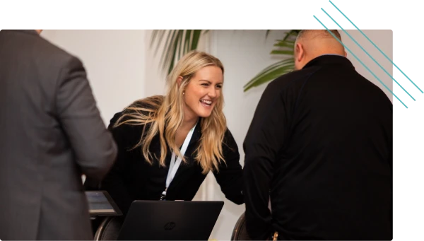 Attendee checking in with event staff